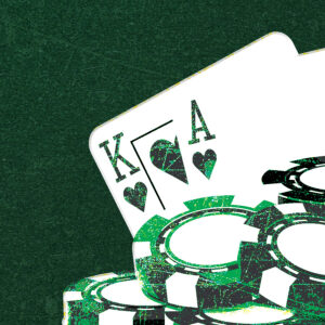Poker chips with a King and Ace of hearts, representing a winning blackjack hand at Turtle Creek Casino.